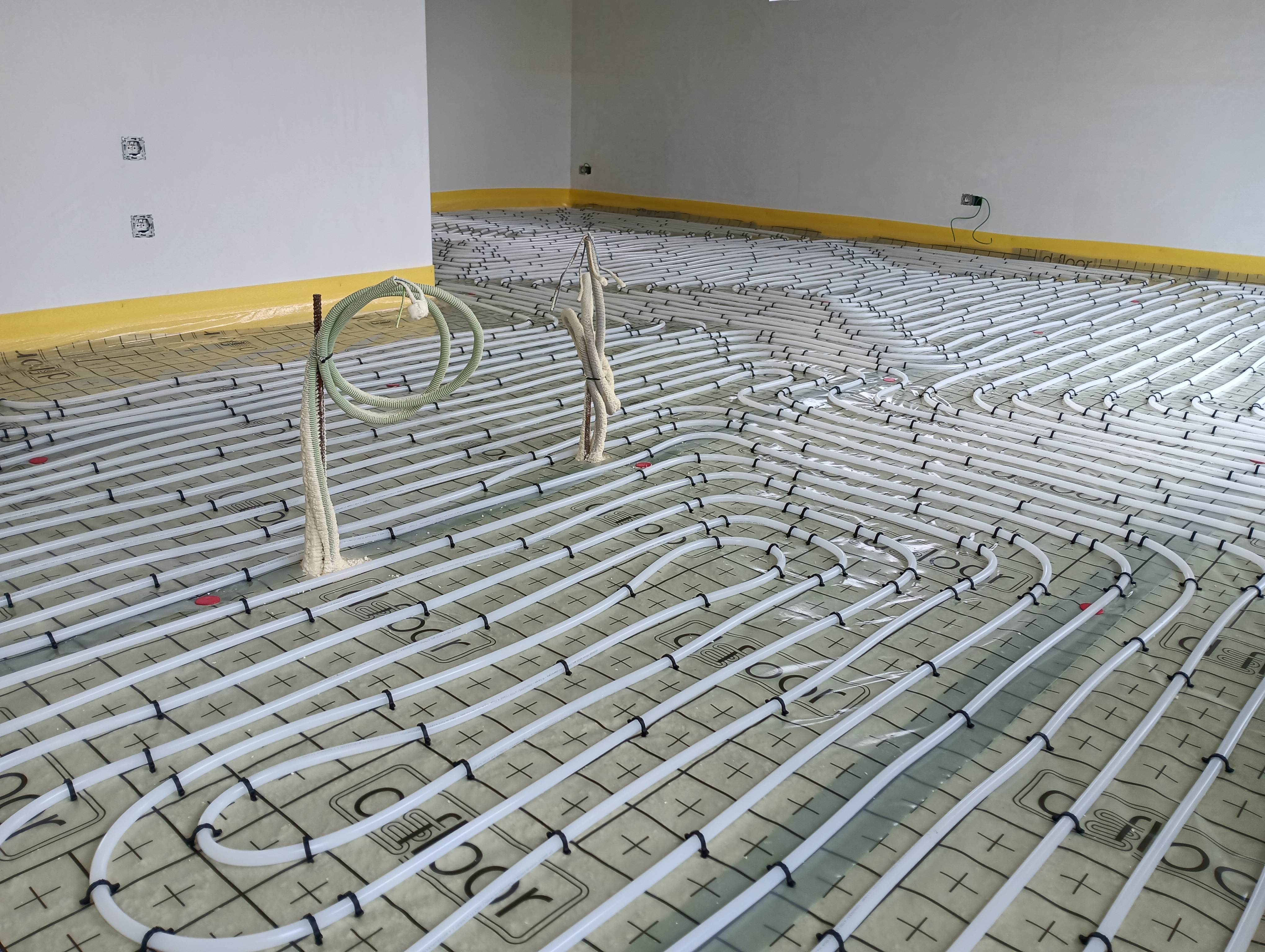 Installation d'un chauffage sol dans deux nouvelles constructions à Thimister
